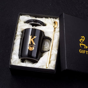 Gold and Black Ceramic Coffee/ Tea Cup With Gold Handle- Comes With A Lid And Spoon