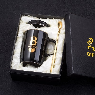 Gold and Black Ceramic Coffee/ Tea Cup With Gold Handle- Comes With A Lid And Spoon