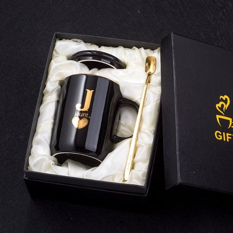 Gold and Black Ceramic Coffee/ Tea Cup With Gold Handle- Comes With A Lid And Spoon