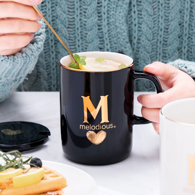 Gold and Black Ceramic Coffee/ Tea Cup With Gold Handle- Comes With A Lid And Spoon