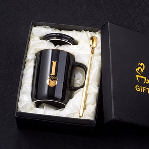 Gold and Black Ceramic Coffee/ Tea Cup With Gold Handle- Comes With A Lid And Spoon