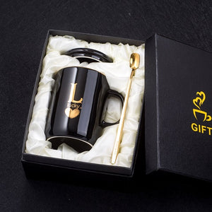 Gold and Black Ceramic Coffee/ Tea Cup With Gold Handle- Comes With A Lid And Spoon