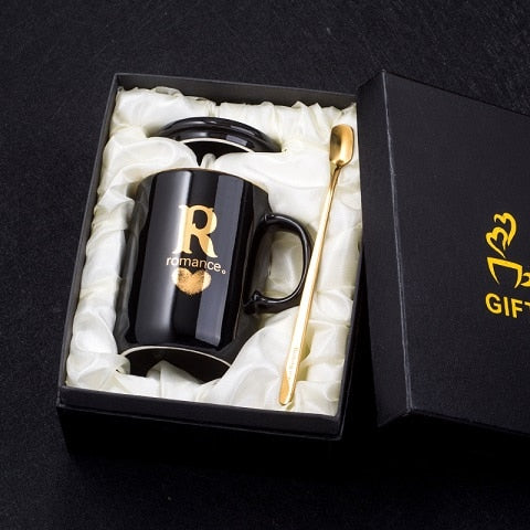 Gold and Black Ceramic Coffee/ Tea Cup With Gold Handle- Comes With A Lid And Spoon