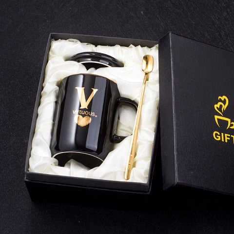 Gold and Black Ceramic Coffee/ Tea Cup With Gold Handle- Comes With A Lid And Spoon